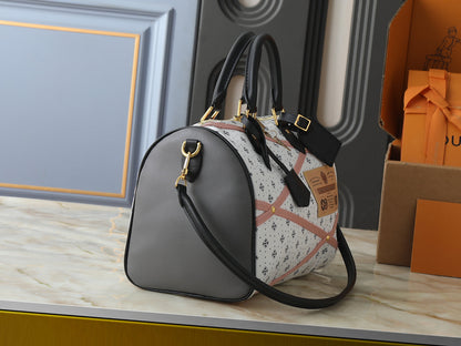 Speedy-Style Handbag With Pink Crisscross Strap Details